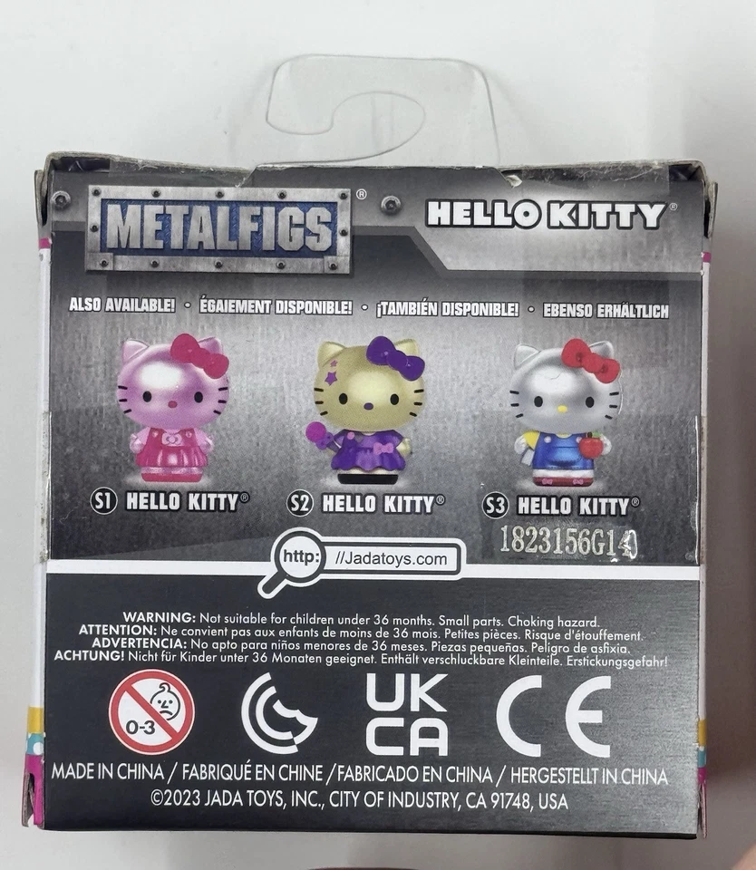 Sanrio S3 MetalFigs Dorado Hello Kitty Púrpura Vestido 2" Mini Figura Jada Toys Nuevo Foto 3 de 4