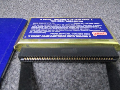 Nintendo NES Game Genie Game Enhancer con Cheat Codes Manuale Libro Galoob - Foto 5 di 7
