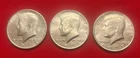 1973 1974 1977 Kennedy Half Dollars - AU - Lot Of Three (3) US 50C Coins