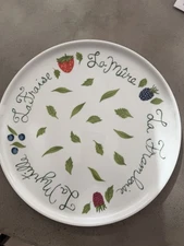 Philippe Deshoulieres Apilco porcelain plate with a fruit design. 11 7/8"