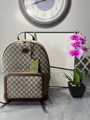 Gucci  Flap Interlocking G Patch GG Supreme Canvas Drawstring Backpack Off White Gucci Gg Supreme Interlocking Gg Backpack - Beige | Editorialist main image 4