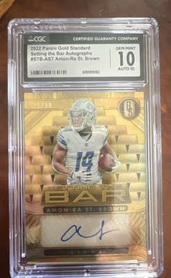 2022 Panini Gold Standard - Setting the Bar Amon-Ra St. Brown #STB-AST /99 (AU)