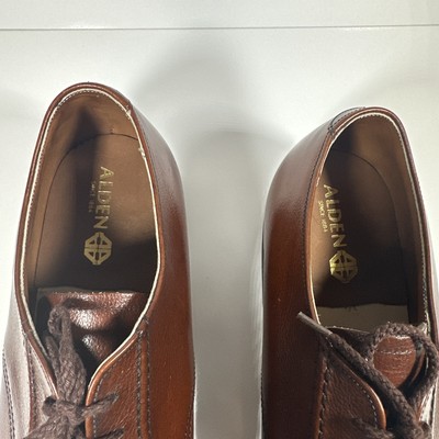 Alden 473 Mocc Toe Blucher is built on the TruSquare last. The model has a brown Antiqued Calf leather upper with a single leather outsole.