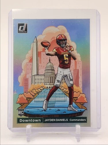 JAYDEN DANIELS 2024 DONRUSS DOWNTOWN ROOKIE SSP DAMAGED RC Q3976