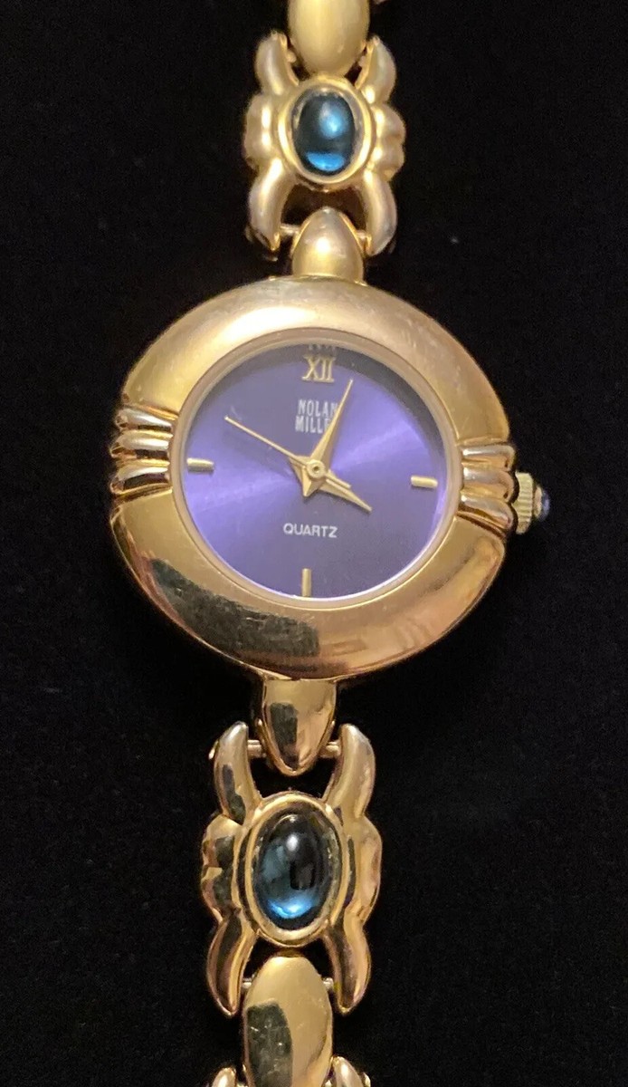 Ladies vintage watch by Nolan Miller. Gold tone with sparkly stones. s-l1200.jpg main image 3