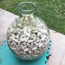 BUDDY HACKET’S FAMOUS WINE CORK COLLECTION IN Italian Bubble Glass Container