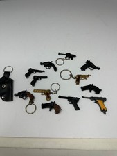 Vintage Lot of 13 Mini Revolver Pistol Keychain Gun 1 Holster 1 Metal 11 Plastic