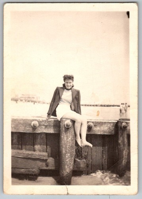 #ad Vtg Bamp;W Snapshot Young Woman In Jacket amp; Striped Top On Beach Pier Sun. 1940s $7.99