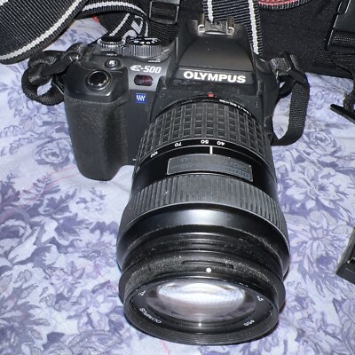Olympus E-500 8MP AF Digital SLR Camera with Case And Accessories