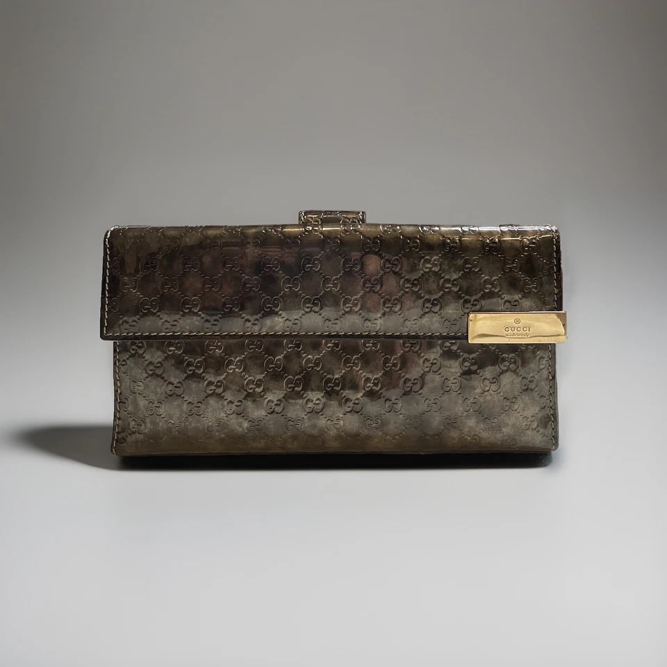 Bolso sin asas Gucci dorado metálico negro Microguccissima charol en relieve Foto 3 de 4