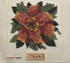 Beautiful hand painted LILLY in shades of red and green.