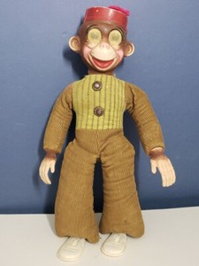 Vintage 1950s celluloid lenticular eyes bell hop monkey doll carnival prize
