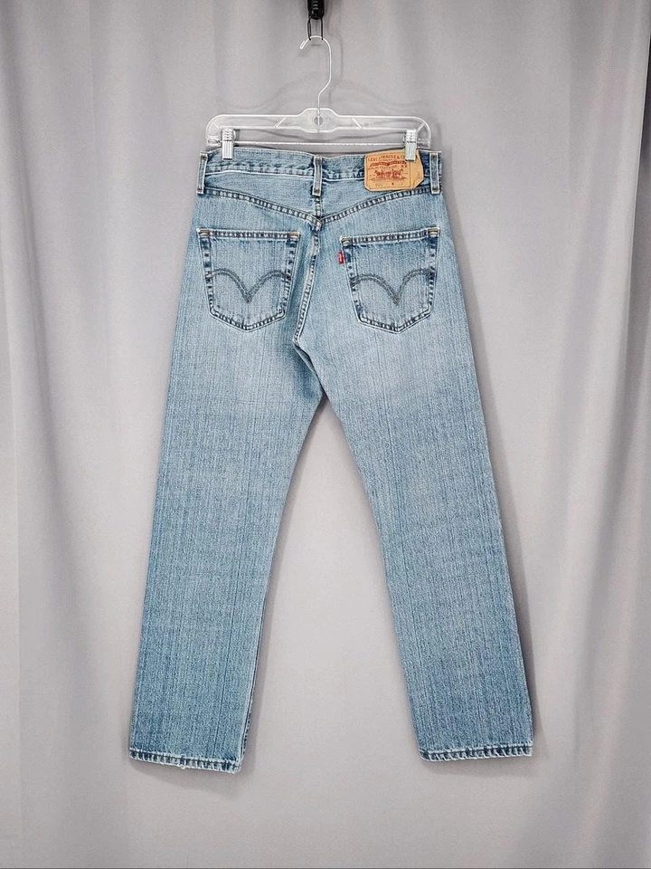 Pantalones de mezclilla vintage Levis 501 para hombre 31x32 azul lavado claro botón mosca lengüeta roja recta Foto 3 de 4