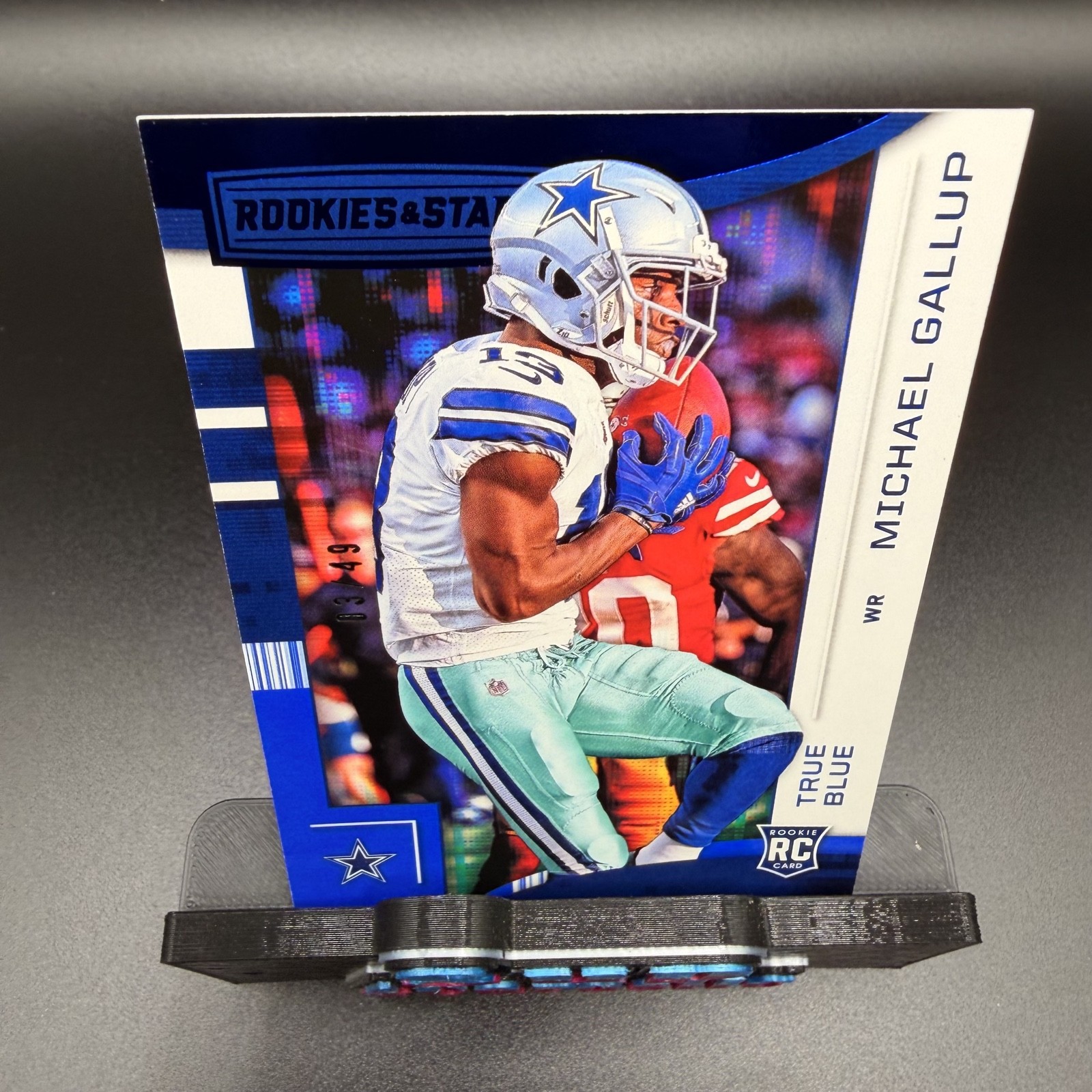 2018 Panini Rookies & Stars - Rookies Michael Gallup #126 True Blue /49 (RC)