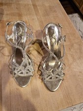Nina silver, strapy, 3 inch heels. Gently used. Adjustable buckle strap closure