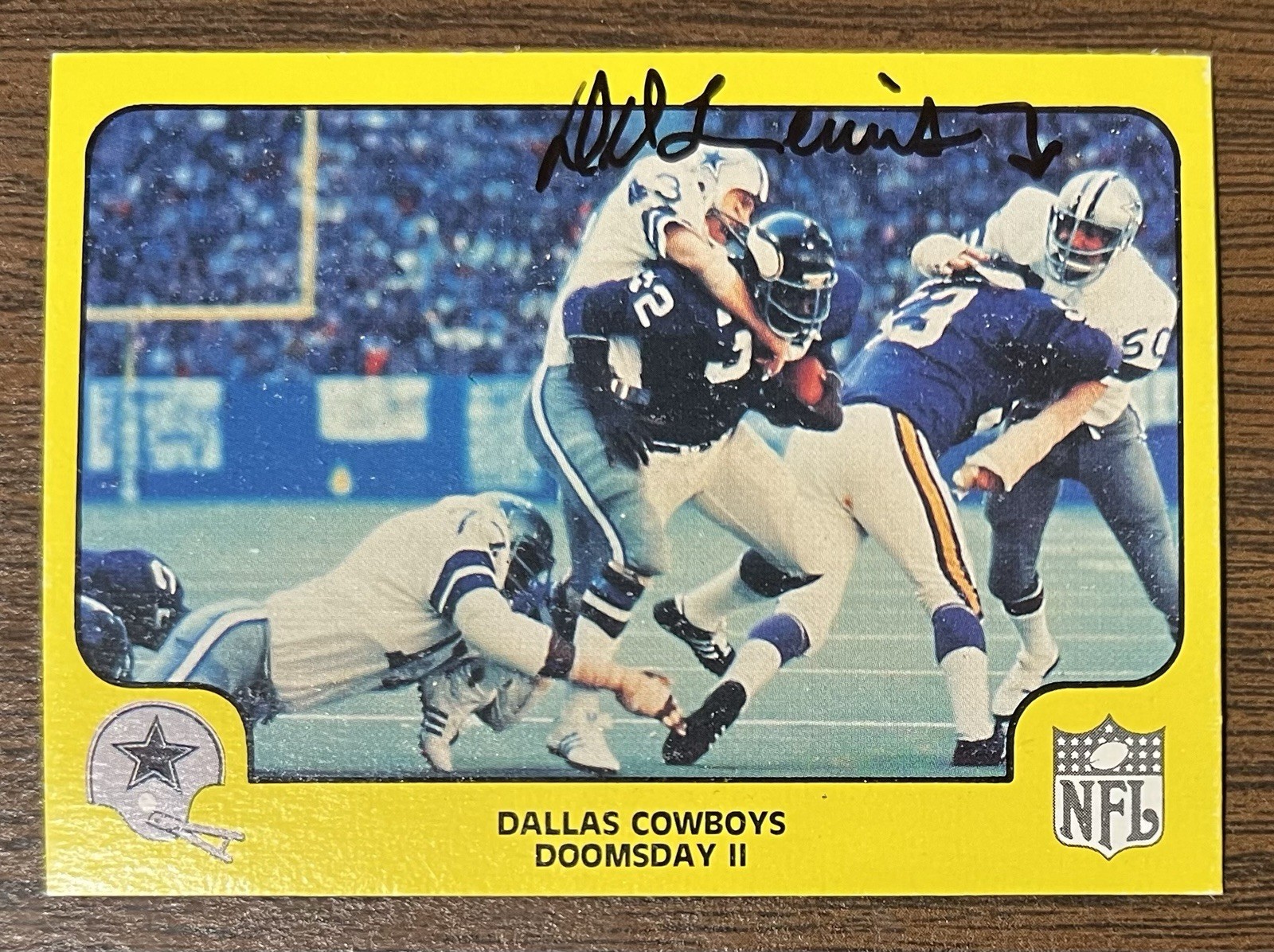 D.D. LEWIS AUTOGRAPHED 1978 FLEER TEAM ACTION FOOTBALL CARD NM # 14 COWBOYS