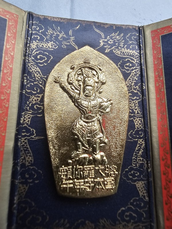 Asian Amulet wrapped in Red and Golden Cover