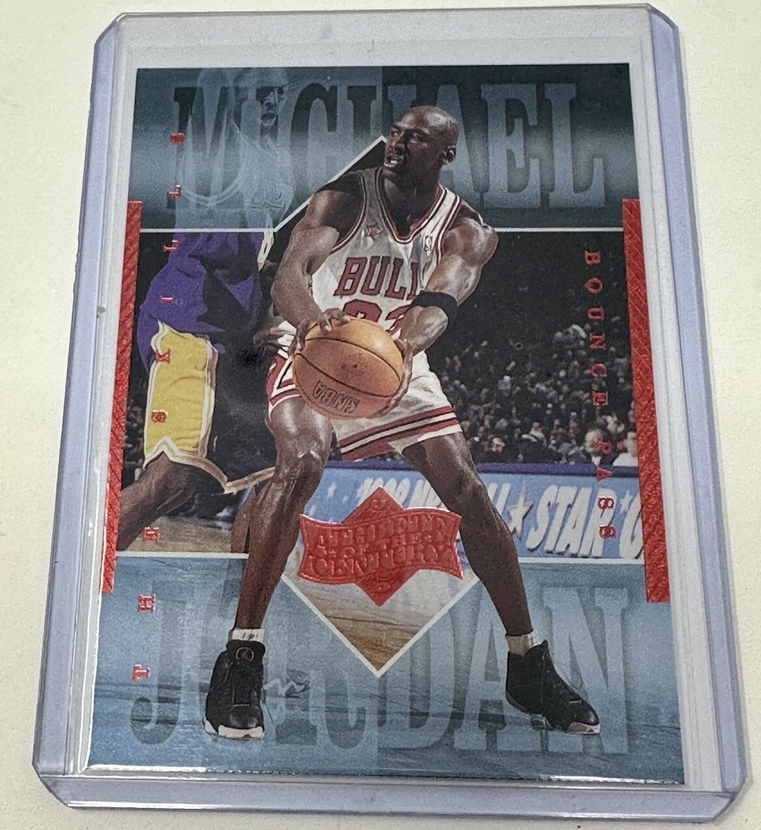 Micheal Jordan upper deck athlete of the century # 25- bounce pass