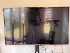 lg 49 inch 4k tv with a stand very rarely used if at all