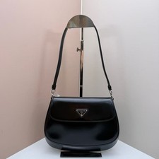 Prada Cleo Small Black Brushed Leather Saddle Bag with Silver Triangle Logo