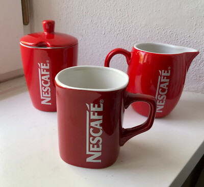 NESCAFÈ Kaffeebecher, Milchkanne und Zuckerdose    rot mit weißem Schriftzug 