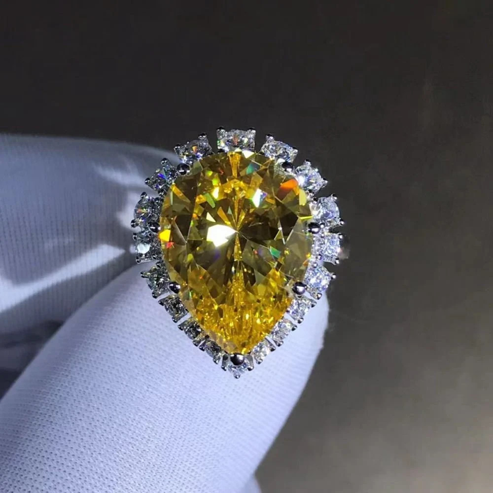 10 Carat Pear Cut Vivid Yellow Moissanite Halo Ring in Platinum 950