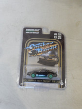 SMOKEY AND THE BANDIT  1977 FIREBIRD CHASE CAR GREENLIGHT  1.64 SCALE 44610
