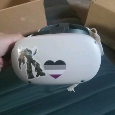 Meta Quest 2 VR Headset with extra battery pack, White, with Touch Controllers