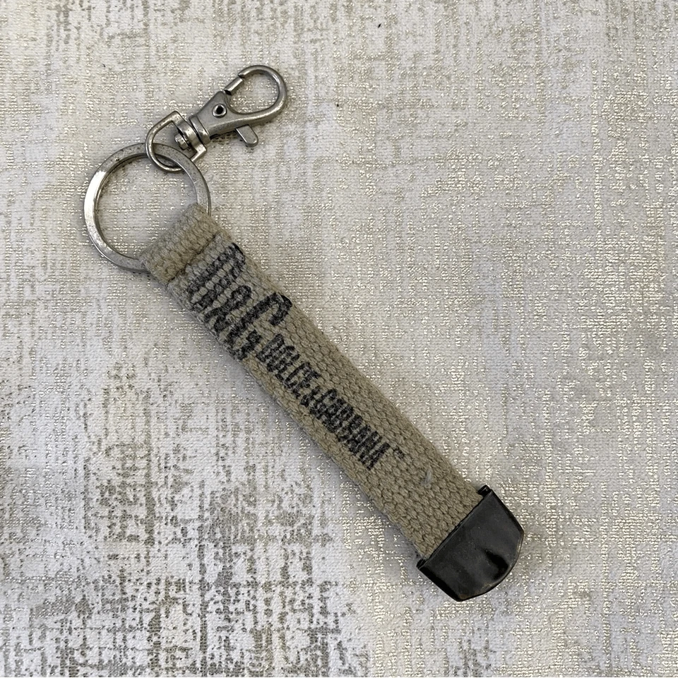 Llavero DOLCE & GABBANA Beige Lona y Metal con Caja y Papeleo. Usado en excelente estado! Foto 2 de 4