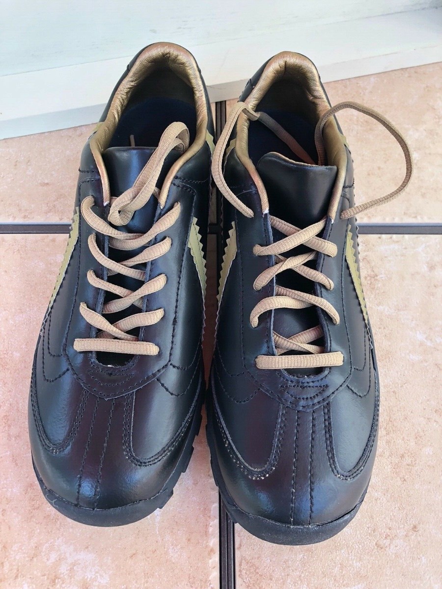 NM70 Sneakers Lace Up Tennis Shoes Ladies Sz 9 / 40 Black & Gold