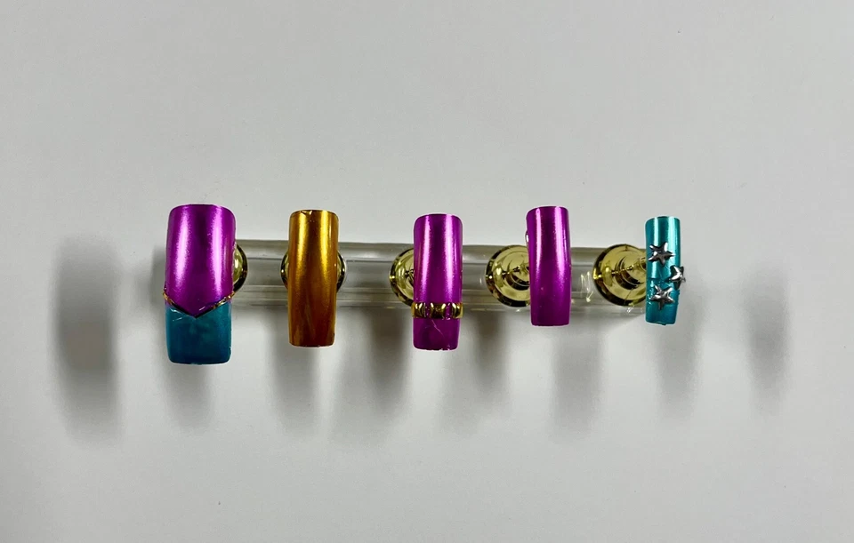 Trío de esmalte en gel metálico - fucsia, azul y dorado Foto 2 de 2