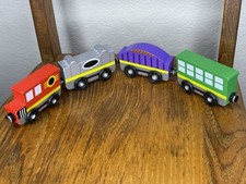 Melissa  Doug Wooden Train Cars Set Toy 4 Piece Magnetic Train Cars