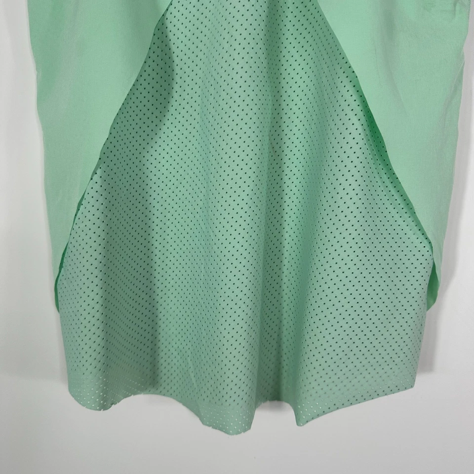 Camiseta sin mangas suelta verde menta Ivivva espalda perforada talla 12? Foto 4 de 4