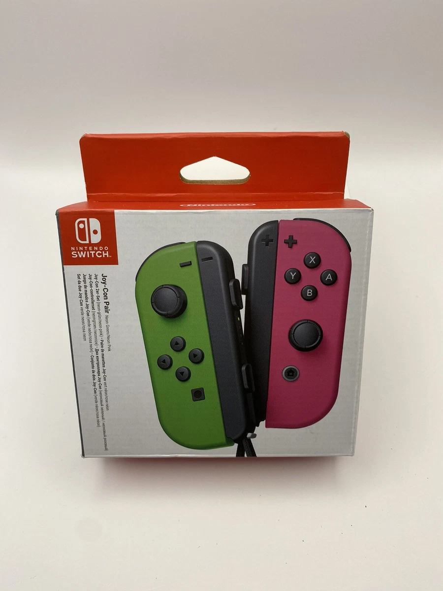 Nintendo switch with green hotsell and pink joy con