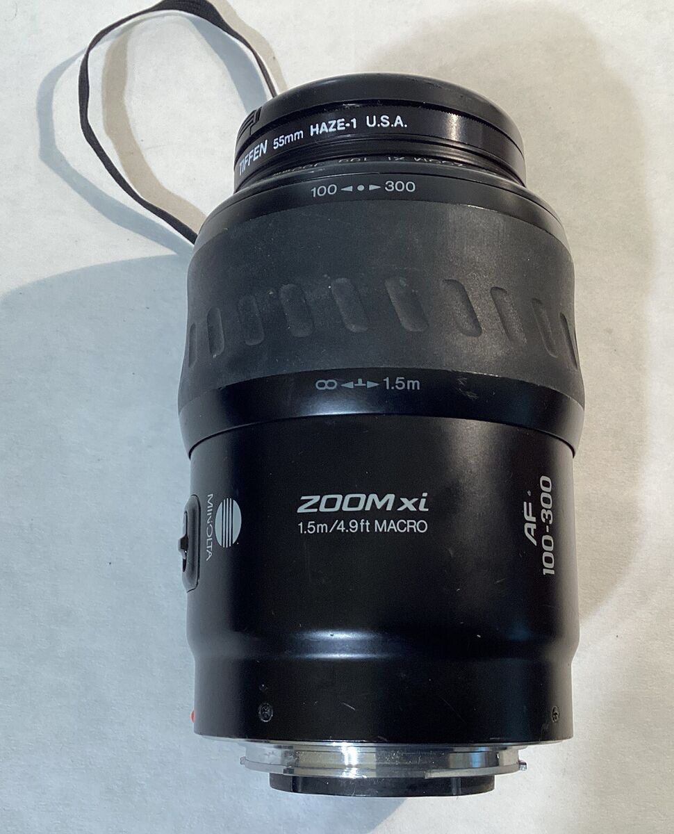 Minolta AF 100-300 Zoom xi 1.5m/4.9ft Macro Telephoto Lens Minolta AF 100-300 Zoom xi 1.5m/4.9ft Macro Telephoto Lens