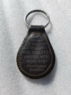 VTG CHRYSLER EMBLEM LEATHER & BRASS KEYCHAIN VIP DELIVERY