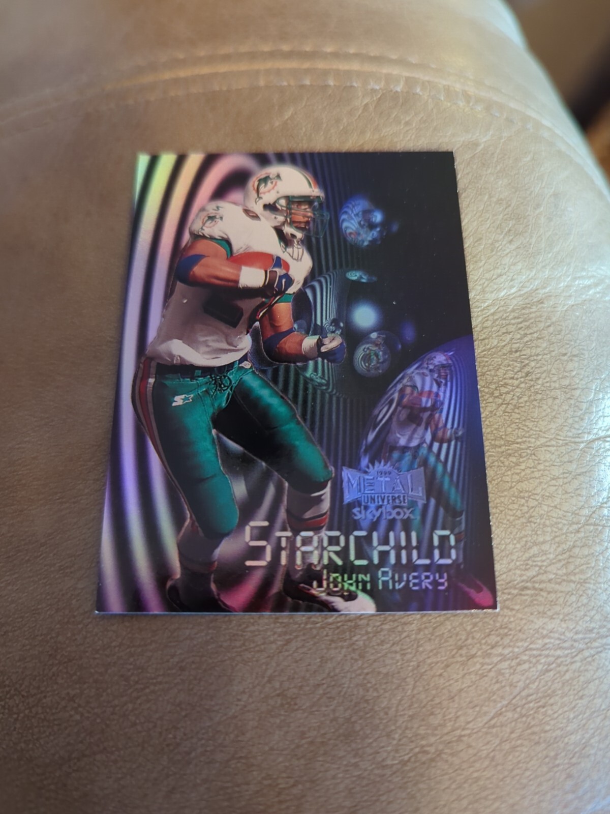 1999 Skybox Metal Universe Starchild John Avery Miami Dolphins #6 6 of 20