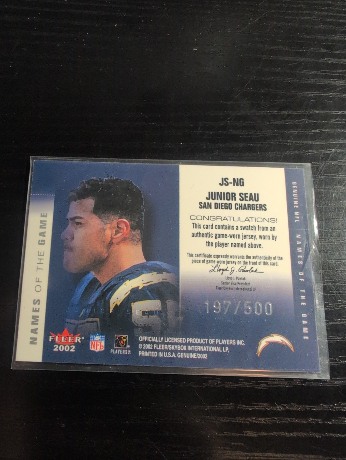 2002 Fleer Genuine Game Names Of The Game Used Jersey Junior Seau /500 (Au) view 2