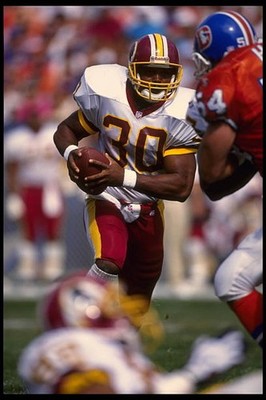 Running back Brian Mitchell Washington Redskins carries the footba- 1995 Photo