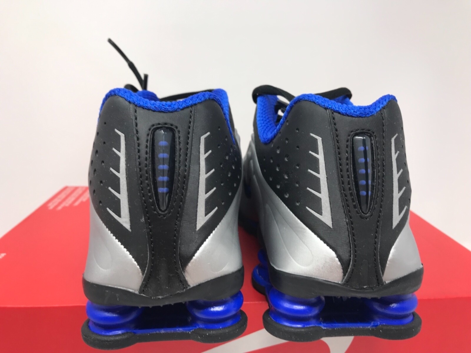 nike shox silver and blue