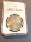 1886 morgan silver dollar ngc ms63 with toning
