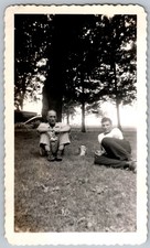 Vtg B&W Snapshot Two Men Relaxing Outdoors Yard Grass Vintage Car Tree 1930s