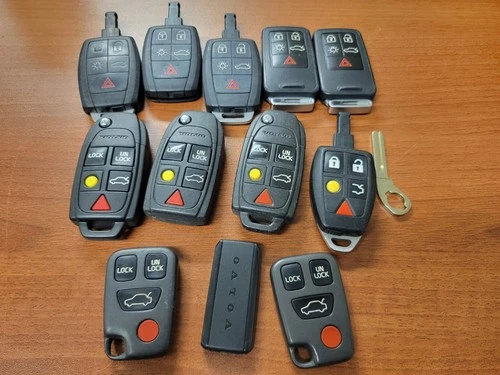 Lot of 11 OEM Volvo Key Fobs Remotes Smart Keys Flip Keys Mixed Used - product listing photo