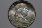 One Album Toned 1963-P Franklin Half Mint State (Stock #: FHX853)