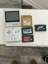 Nintendo Game Boy Advance SP Handheld Bundle- Silver w/ Travel Case and Games