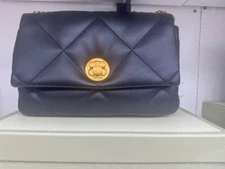 Fashionable,youthful women`s handbag,color brown,eco leater