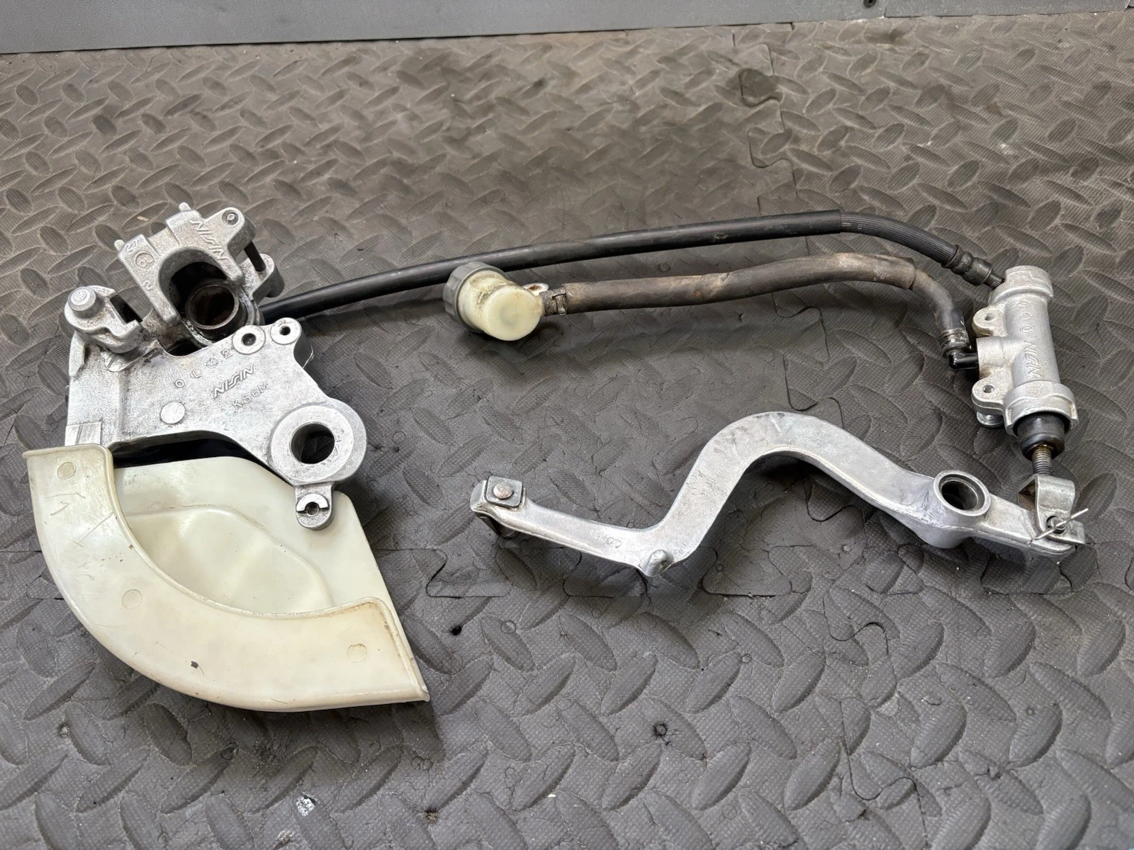 1988-1989 Honda CR125 CR250 CR500 OEM Rear Brake Caliper Master Cylinder Lever