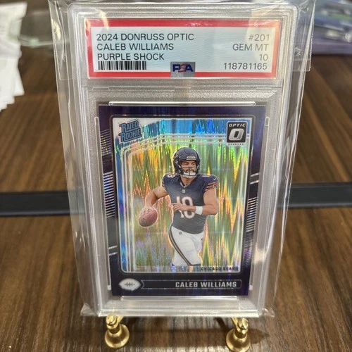 🐻🐻2024 Panini Donruss Optic - Rated Rookie Caleb Williams Purple Shock PSA 10