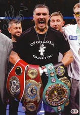 OLEKSANDR USYK SIGNED 16x12 UNDISPUTED CHAMP PHOTO (ACG CERT AG25430)