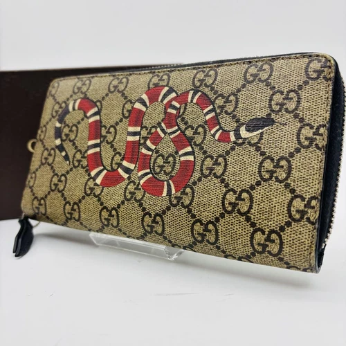 Authentique portefeuille Gucci couleur marron noir cuir pvc L19 cm L10 cm T2 cm fermeture éclair ronde